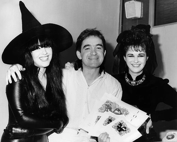 Jill Bryson and Rose McDowell of Strawberry Switchblade dressed in witches hats