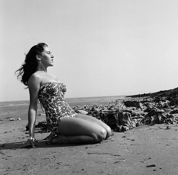 Jill Randle, ballet dancer from Porth, on the beach at Barry Island. 7th June 1952