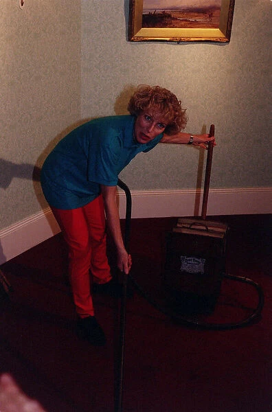 Jilly Goolden TV Presenter March 1998 Useing an antique hoover at the 1998 Daily