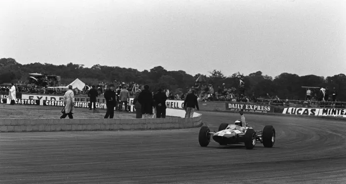 Framed Print : Jim Clark waves as he wins the British Grand Prix at Silverstone in 1965 in his Lotus Framed Print : Jim Clark waves as he wins the British Grand Prix at Silverstone in 1965 in his Lotus
