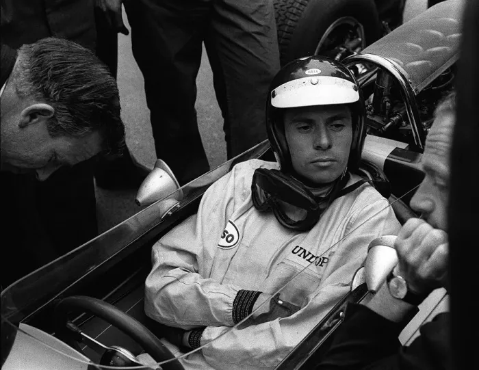 Framed Print : Jim Clarke before the start of the British Grand Prix at Silverstone which he won in his Framed Print : Jim Clarke before the start of the British Grand Prix at Silverstone which he won in his
