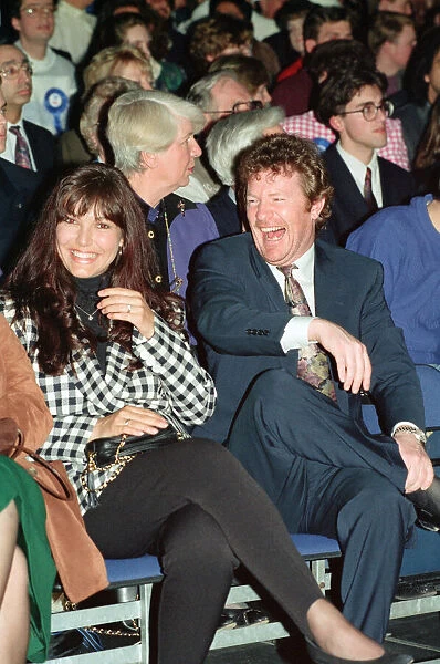 Jim Davidson pictured in the audience of a conservative rally, Wembley. 5th April 1992