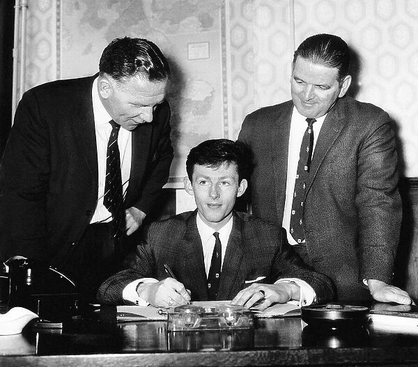 Jim Robertson signing for Tottenham Hotspur for £23, 000 from St Mirren
