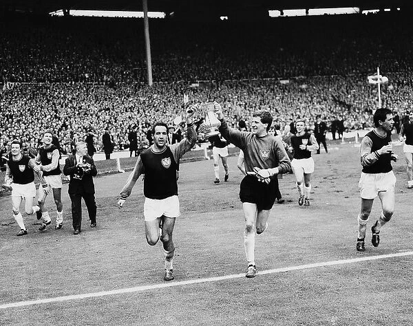 Jim Standen the Goalie of West Ham and team celebrate victory. FA Cup final 1964