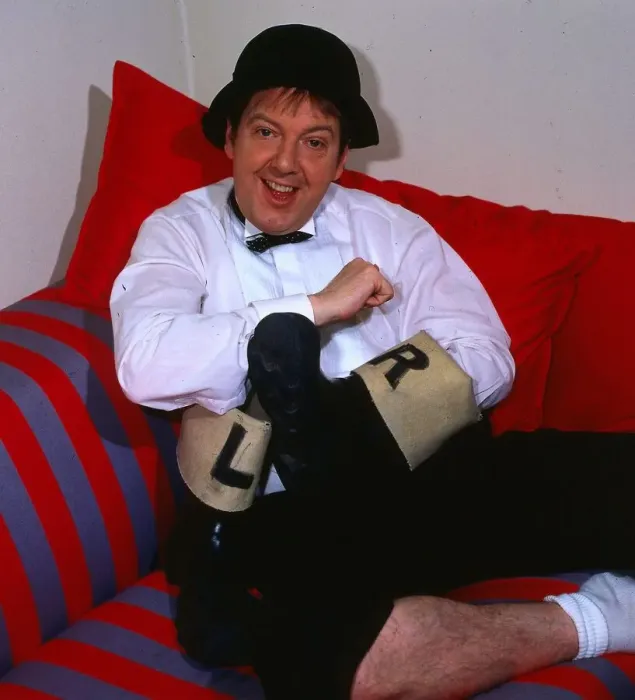 Framed Print : Jimmy Cricket comedian September 1986 holding left and right wellies welly boots