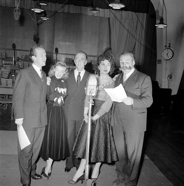 Jimmy Edwards with the 'Take it from here'cast members at the BBC studios in