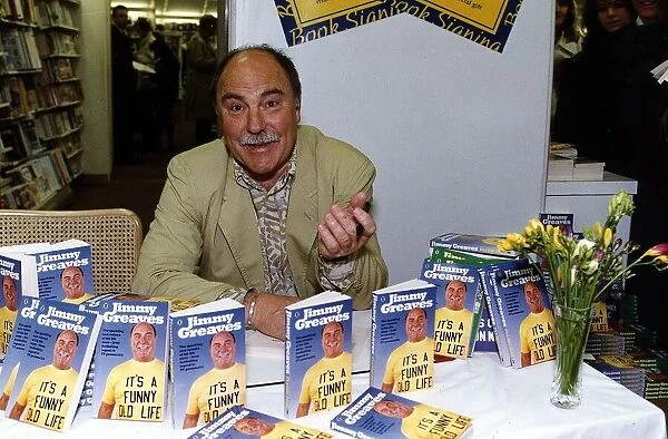 Jimmy Greaves former England footballer signs copies of his book It