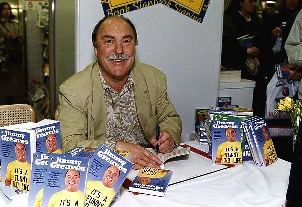 Jimmy Greaves former England footballer signs copies of his book at W H Smiths in Holborn