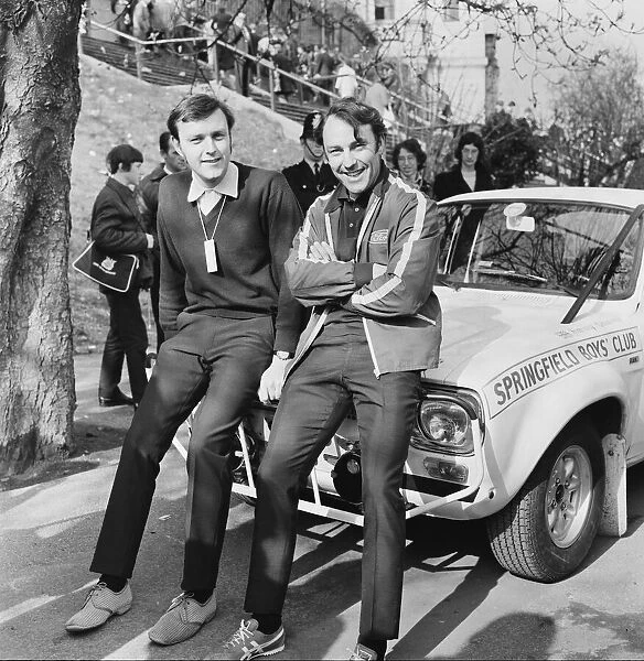 Jimmy Greaves sitting on his car at the start of the World Cup Rally at Wembley