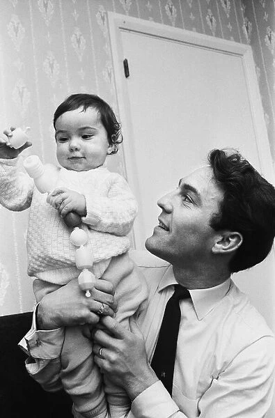 Jimmy Greaves with his son Danny at home. 2nd February 1964