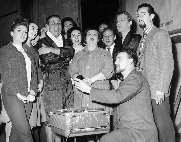 Jimmy Hill of Coventry City seen here with Sid James and the cast of Puss in Boots record