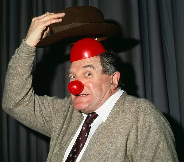 Jimmy Logan wearing red nose March 1989