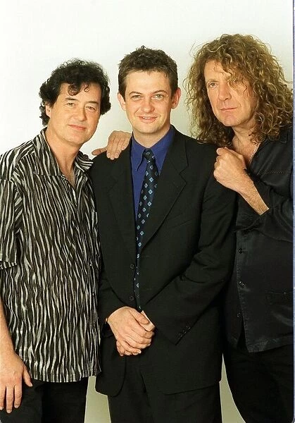 Jimmy Page former lead guitarist of the pop group Lead Zeppelin with Robert Plant former