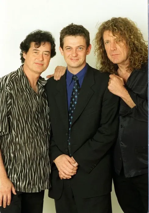 Framed Print : Jimmy Page former lead guitarist of the pop group Lead Zeppelin with Robert Plant former