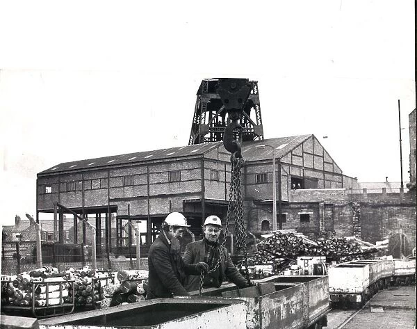 Jimmy Weatherby (left) and Alan Nelson unload equipment salvaged from Elemore Colliery