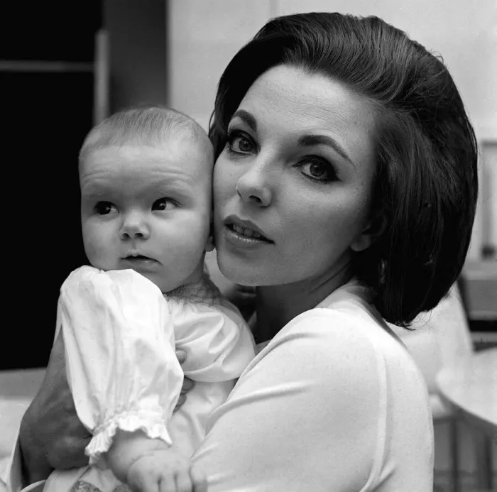 Framed Print : Joan Collins Actress February 1964 with four months old daughter Tara Newley Framed Print : Joan Collins Actress February 1964 with four months old daughter Tara Newley