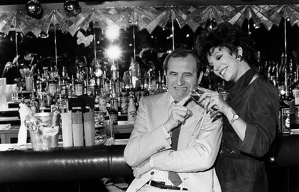 Joan Collins actress with Leonard Rossiter in Cinzano advert