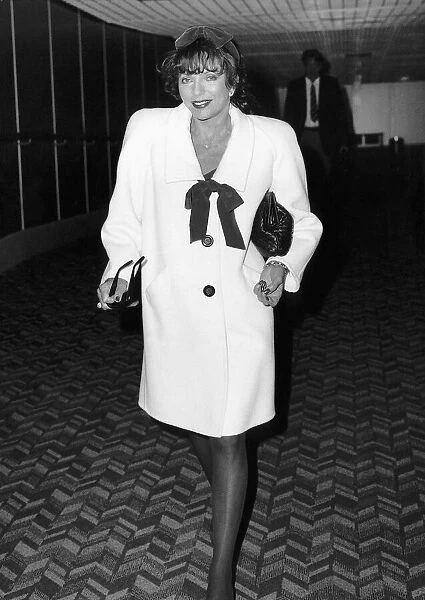 Joan Collins actress starred in Dynasty arrives Heathrow Airport, March 1988
