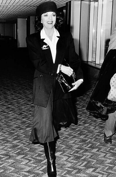 Joan Collins actress starred in Dynasty arrives at Heathrow, February 1988