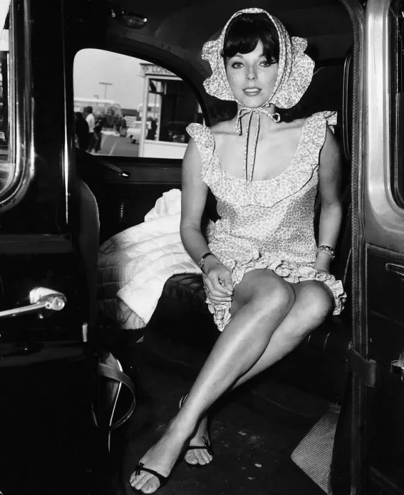 Framed Print : Joan Collins actress wearing a bonet