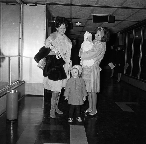 Joan Collins arriving by British European Airways from Paris with her daughter Tara