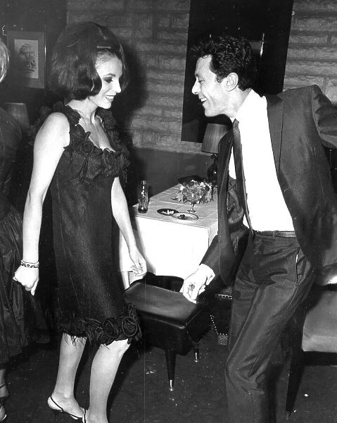 Joan Collins and Lionel Blair dancing in nightclub - April 1964