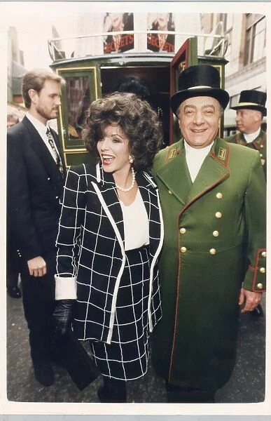 JOAN COLLINS AND MOHAMMED AL FAYED OUTSIDE HARRODS 22  /  07  /  1999