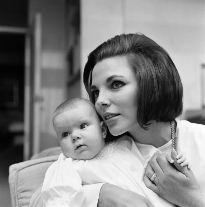 Framed Print : Joan Collins pictured with her four-month-old daughter Tara Newley Framed Print : Joan Collins pictured with her four-month-old daughter Tara Newley