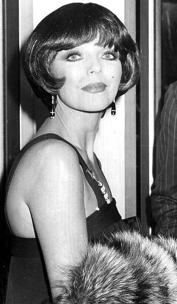 Joan Collins at premiere wearing short twenties style bob haircut - April 1974