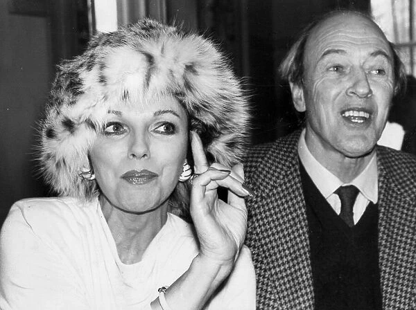 Joan Collins wearing fur hat with Roald Dahl at TV press conference - March 1979