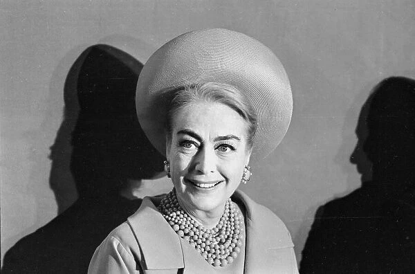 Joan Crawford portrait smiling hat earings pearl jewellery