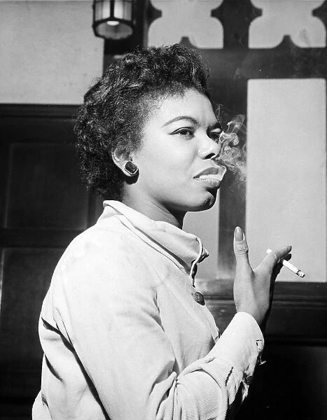 Joan Hooley actress smoking October 1958