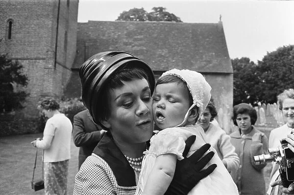 Joan Plowright attends the Christening of her daughter Tamsin. 14th July 1963
