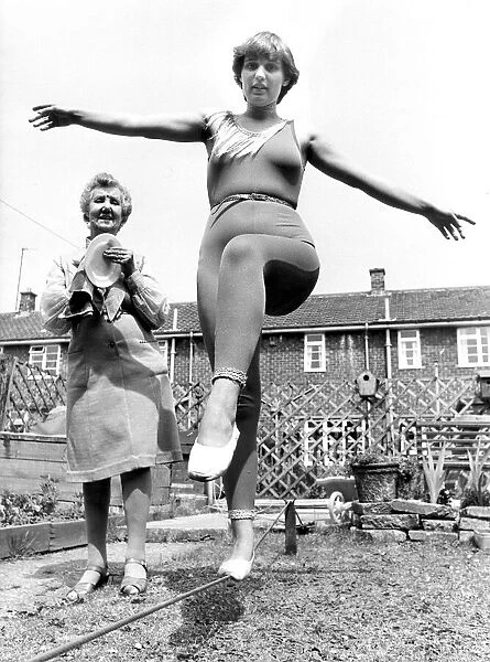 Joanna Curtis practising the tight-rope watched by nana Julia Holtby