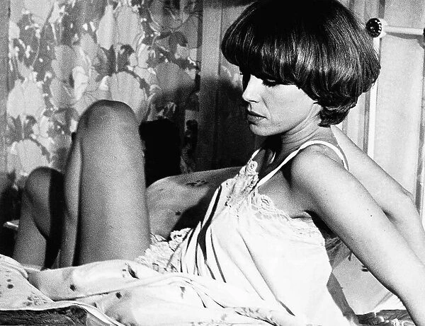 Joanna Lumley Actress as Passionate Purdey in a bed room scene for TV show the New