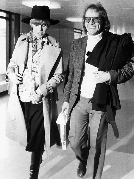 Joanna Lumley and Dennis Waterman at airport 1977