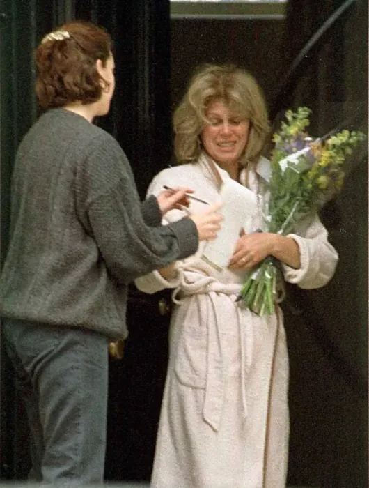 Framed Print : Joanna Lumley at home receiving flowers from the Daily Mirror Framed Print : Joanna Lumley at home receiving flowers from the Daily Mirror
