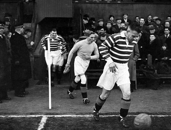 Jock Shaw leads out Rangers in the game against Falkirk at Brockville Park