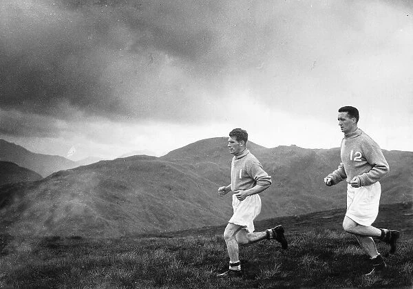 Jock Stein Celtic football player running up Ben Lomond with team mate John Bonnar (L
