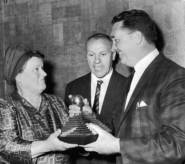 Jock Stein receives a trophy from Mrs Bessie Braddock for the manager of the year award
