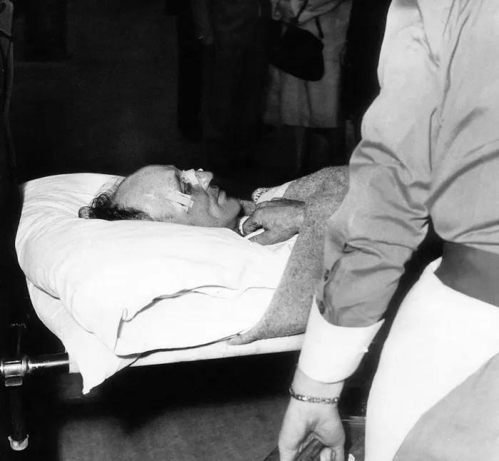 Framed Print : Jockey Arthur Scobie'Breasley arriving at a London Clinic on a stretcher Framed Print : Jockey Arthur Scobie'Breasley arriving at a London Clinic on a stretcher