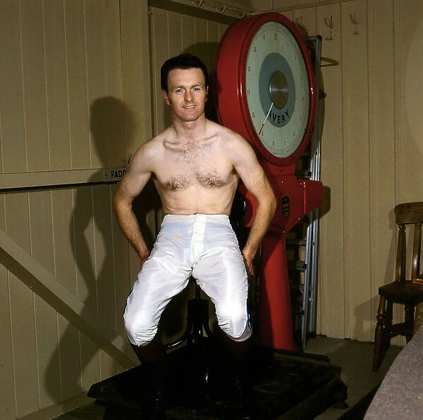 Jockey Jonjo O Neill sitting on a weighing machine, March 1985