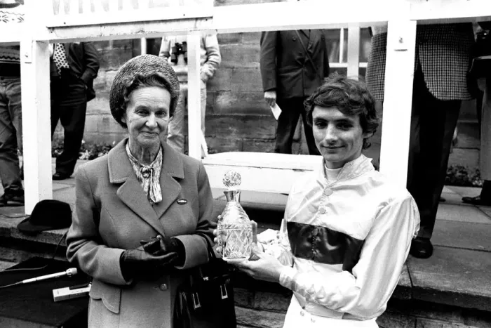 Framed Print : Jockey Walter Swinburn receives a winners trophy at Gosforth Park Racecourse, Newcastle Framed Print : Jockey Walter Swinburn receives a winners trophy at Gosforth Park Racecourse, Newcastle