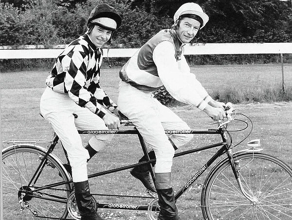 Jockeys Steve Cauthen and Lester Piggott sharing a tandem, June 1979