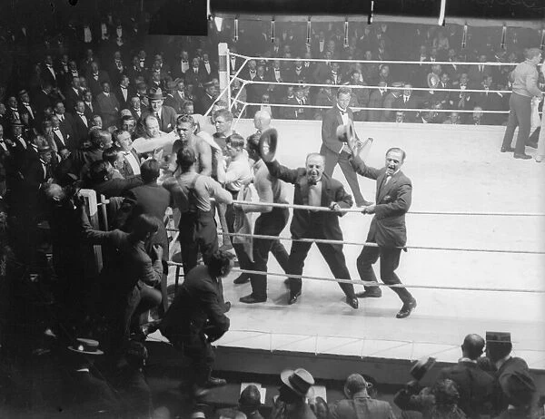 Joe Beckett and his supporters celebrate after knocking out Frank Goddard in the British