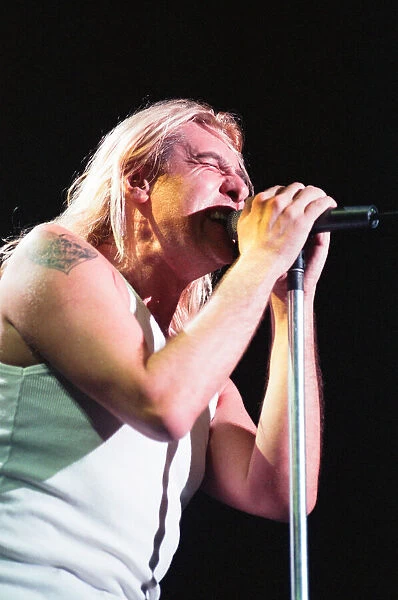 Joe Elliott of Def Leppard performing live at the NEC Birmingham. 16th November 1996