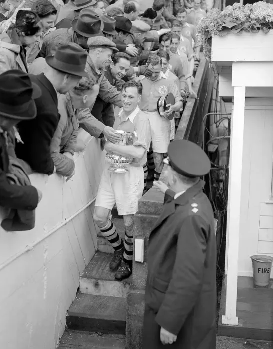 Framed Print : Joe Mercer walks down from the Royal Box at Wembley after collecting the FA Cup for