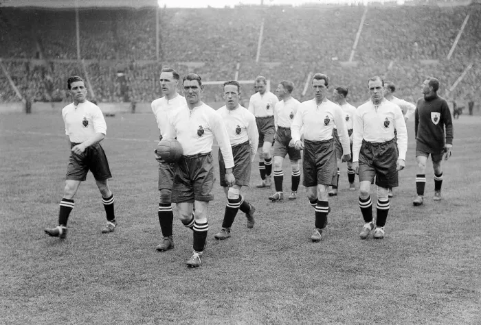 Framed Print : Joe Smith leading the Bolton team onto the Wembley Pitch FA Cup Final 1926