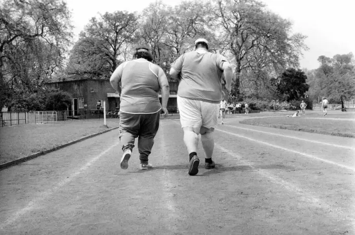 Framed Print : Jogger-nauts: John Robinson sports writer with Colin Taylor jogging in Battersea Park