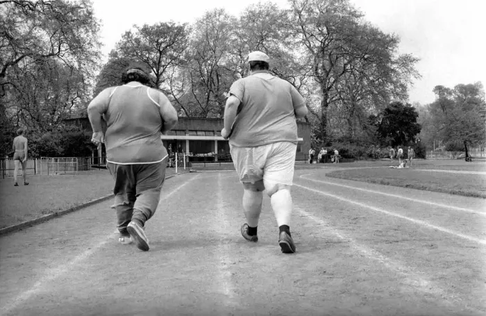 Framed Print : Jogger-nauts: John Robinson sports writer with Colin Taylor jogging in Battersea Park Framed Print : Jogger-nauts: John Robinson sports writer with Colin Taylor jogging in Battersea Park